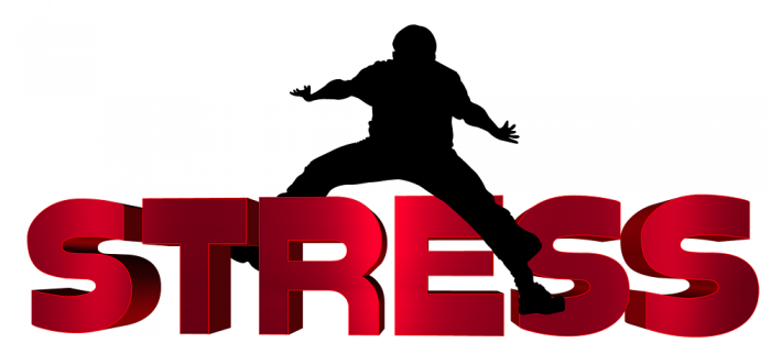 Silhouette man jumping over "STRESS"